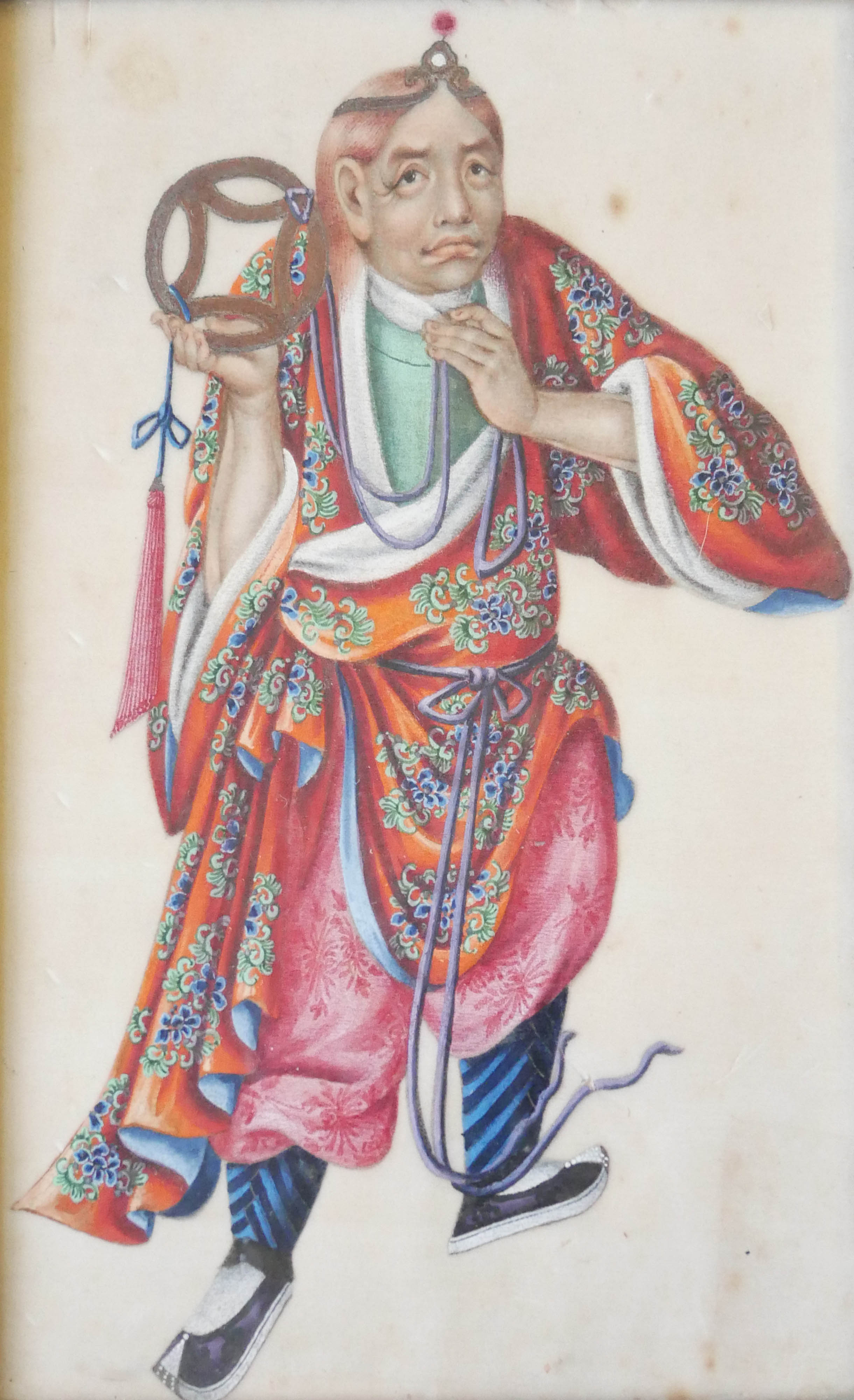 A 19TH CENTURY CHINESE WATERCOLOUR ON SILK PORTRAIT Holding a large bronze wheel and colourful