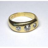 A HEAVY 18CT GOLD RING Set with three diamonds (size W). (approx 1.75ct) weight approx 12gm.