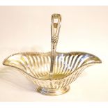 AN EDWARDIAN SILVER SWING BASKET Classical form with pierced decoration, hallmarked Goldsmiths and