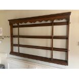 AN 18TH CENTURY OAK WALL HANGING PLATE RACK. (108cm x 171cm x 16cm)