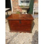 A 19TH CENTURY SOLID WALNUT AND BRASS BOUND COFFER With internal candle box and iron carrying