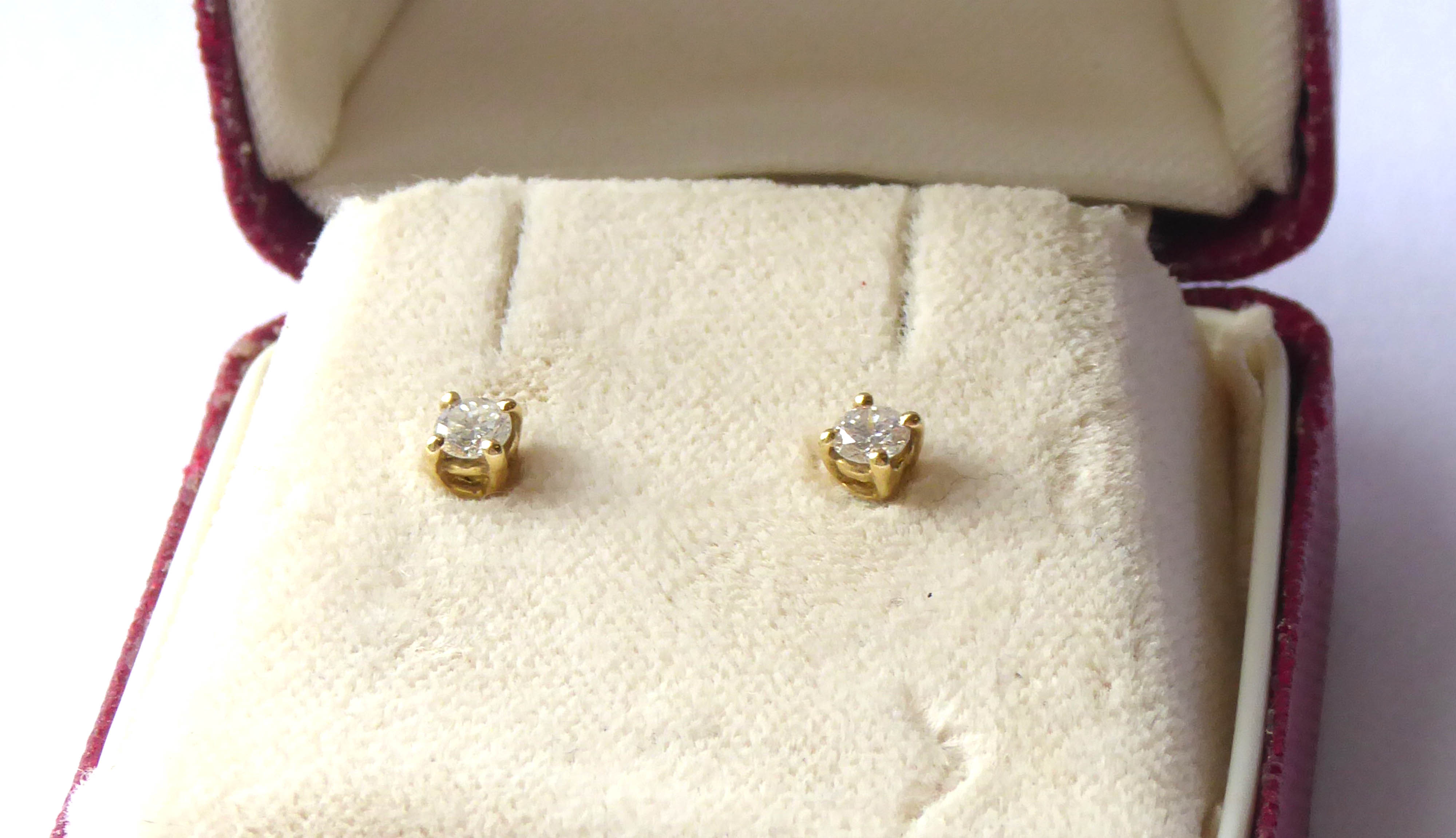 A PAIR OF 18CT GOLD AND DIAMOND STUD EARRINGS Each having a single round cut diamond. Colour G VSI - Image 2 of 2