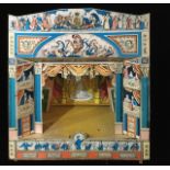 A VINTAGE POLLOCK'S WOODEN TOY/MODEL THEATRE AND ACCESSORIES Classical form facade with backdrop,