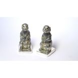 A PAIR OF SILVER NOVELTY SALT AND PEPPER POTS Modelled as hares/rabbits with glass eyes. (approx