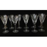 GLENEAGLES, A SET OF ELEVEN CUT LEAD CRYSTAL WINE GLASSES Trumpet form with leaf design cuts and