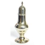 A GEORGIAN SILVER CASTER Pierced dome lid and of baluster form, hallmarked London, TD, 1782. (approx