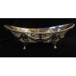 A VICTORIAN SCOTTISH SILVER BREAD BASKET Classical form with rams lead masks and pierced design,