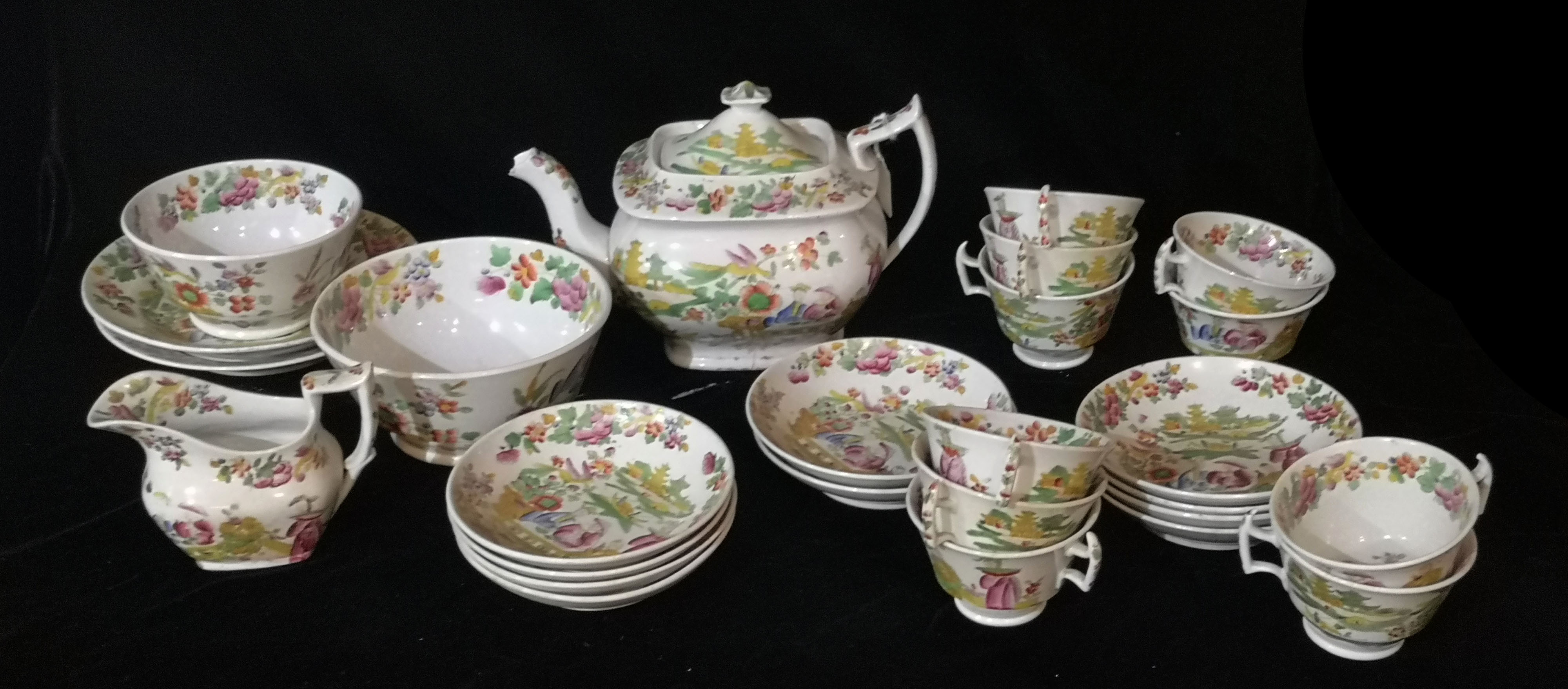 AN EARLY 19TH CENTURY ENGLISH POTTERY TEA SERVICE Decorated in a Chinese tea drinking ceremony