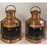 A PAIR OF COPPER PORT AND STARBOARD OIL LANTERNS. A pair of copper port and starboard oil lanterns.