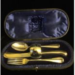 A CASED VICTORIAN SILVER FOUR PIECE CHRISTENING SET Comprising a fork, spoon, knife and napkin ring,
