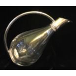 ASPREY, A SILVER AND GLASS CLARET JUG Modern design with sweeping handle, hallmarked London,