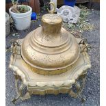 AN ANTIQUE ISLAMIC BRASS FIRE PIT The circular pierced top enclosing liner, raised on splayed