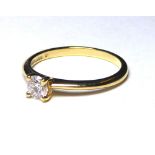 AN 18K GOLD AND 0.30 ROUND BRILLIANT CUT DIAMOND SOLITAIRE RING (size L). weight approx 2gm.