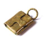 A VICTORIAN GILT METAL LOCKET Of envelope form with hinged compartment. (approx 1.5cm x 2cm) (weight
