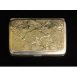 AN EARLY 20TH CENTURY SILVER PICTORIAL SNUFF BOX Finely chased hunting scene of a hound and fox,