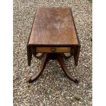 A 19TH CENTURY MAHOGANY PEMBROKE TABLE Having a single drawer, raised on a turned and column with