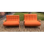 TWO MID TO LATE 20TH CENTURY DESIGNER TWO SEATER SETTEES Newly upholstered in a buttoned burnt