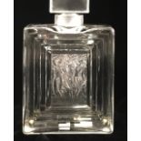 LALIQUE, A FROSTED AND CLEAR GLASS PERFUME BOTTLE Titled 'Duncan 2', having three figures to centre.