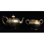 A VICTORIAN SILVER BACHELOR'S GLOBULAR TEAPOT AND SUGAR BASIN With ivory finial, wooden handle and