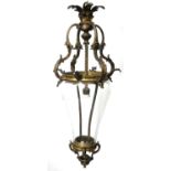 19TH CENTURY FRENCH GILT BRONZE HALL LANTERN With scrolling leaf decoration and shape glass. (drop