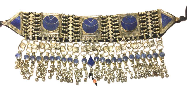 A CONTINENTAL BRASS AN LAPIS LAZULI COSTUME BELT Having geometric form stones and tassel drops. (