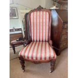 A VICTORIAN CARVED WALNUT AND UPHOLSTERED SIDE CHAIR.
