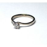 AN 18K WHITE GOLD AND 0.31 BRILLIANT CUT SOLITAIRE DIAMOND RING (size L). weight approx 2gm.