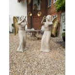 TWO LARGE DECORATIVE LIFE SIZE FIGURES OF MUSICAL WINGED ANGELS BLOWING HORNS. (163cm x 56cm x