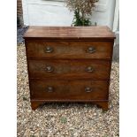 A GEORGIAN MAHOGANY CHEST OF THREE LONG DRAWERS.