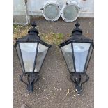 A PAIR OF WESTMINSTER STYLE IRON AND COPPER LANTERN LIGHTS With six tapering hexagonal sides. (120cm