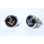 A PAIR OF SILVER AND ENAMEL MASONIC GENT'S CUFFLINKS Circular form with set square, marked .925.