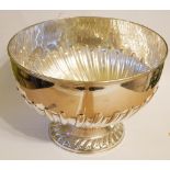 AN EDWARDIAN SILVER CIRCULAR PUNCH BOWL With embossed flutes to body, hallmarked William Hutton