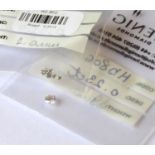 A COLLECTION OF LOOSE ROUND CUT DIAMONDS Comprising one 3.9mm and six 2.0mm stones.