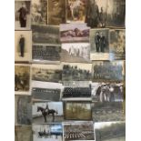 A COLLECTION OF TWENTY-FIVE MILITARY WWI AND WWII PHOTOGRAPHIC POSTCARDS Including equestrian