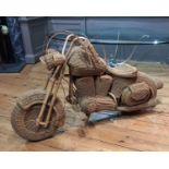 A FULL SIZE WICKER MODEL OF A HARLEY DAVISON MOTOR CYCLE. (170cm x 102cm)