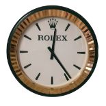 AN ORIGINAL ROLEX SPORTS CIRCULAR WALL CLOCK Green and gilt metal case, numbered registration plaque