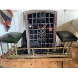 A VICTORIAN BRASS FIRE CLUB FENDER With leather padded seats, raised on candy twist support. (