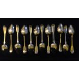 A SET OF TWELVE GEORGIAN SILVER DESSERT SPOONS Fidfld pattern, hallmarked Thomas Daniel, London,