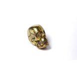 A BRASS NOVELTY VESTA CASE Modelled as a human skull. (approx 4cm) (weight approx 46g)