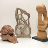 A GROUP OF THREE STUDIO SCULPTURES To include carved stone crouching figure and stylized portrait