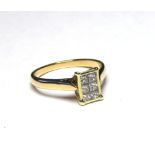 AN 18K GOLD RING SET WITH SIX PRINCESS CUT DIAMONDS (size N). weight approx 4.4gm.