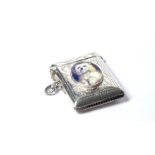 A SILVER AND ENAMEL NOVELTY VESTA CASE Having a modern enamel portrait of a dog, hallmarked