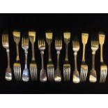 A RARE SET OF TWELVE GEORGIAN NEWCASTLE SILVER FORKS Fiddle pattern, hallmarked John Walton,