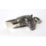 A SILVER NOVELTY WHISTLE Modelled as a horses head, marked .925 Sterling. (approx 4cm) (weight