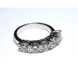 AN 18K WHITE GOLD FIVE STONE DIAMOND RING (size M). (diamond weight 2.58ct) weight approx 5.5gm.
