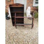 AN EARLY 20TH CENTURY OAK FLOOR STANDING SET OF OPEN BOOKSHELVES Along with an open set of wall