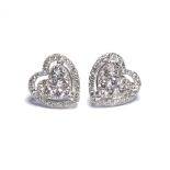 A PAIR OF 18K WHITE GOLD HEART FORM EARRINGS Halo set with 1.2ct of diamonds. (1.4cm) weight