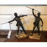 A PAIR OF FRENCH ART DECO BRONZED STATUES OF ROMAN ATHLETES On marble bases. (23cm)