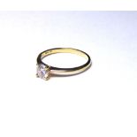 AN 18K GOLD AND 0.51 ROUND BRILLIANT CUT DIAMOND SOLITAIRE RING (size M). weight approx 2gm.