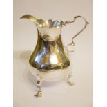 A GEORGE II SILVER BALUSTER CREAM JUG With scalloped edge, hallmarked John Muns, London, 1758. (